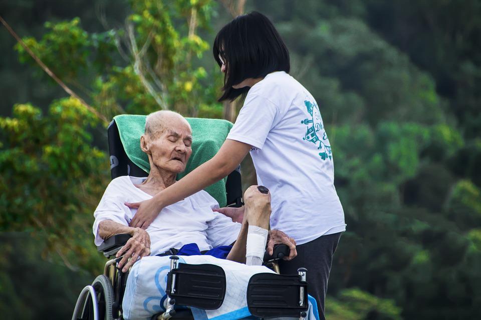 Elderly Woman In Wheel Chair Master Image